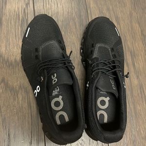 Brand new/never worn all black size 7.5 woman’s ON Running sneakers.